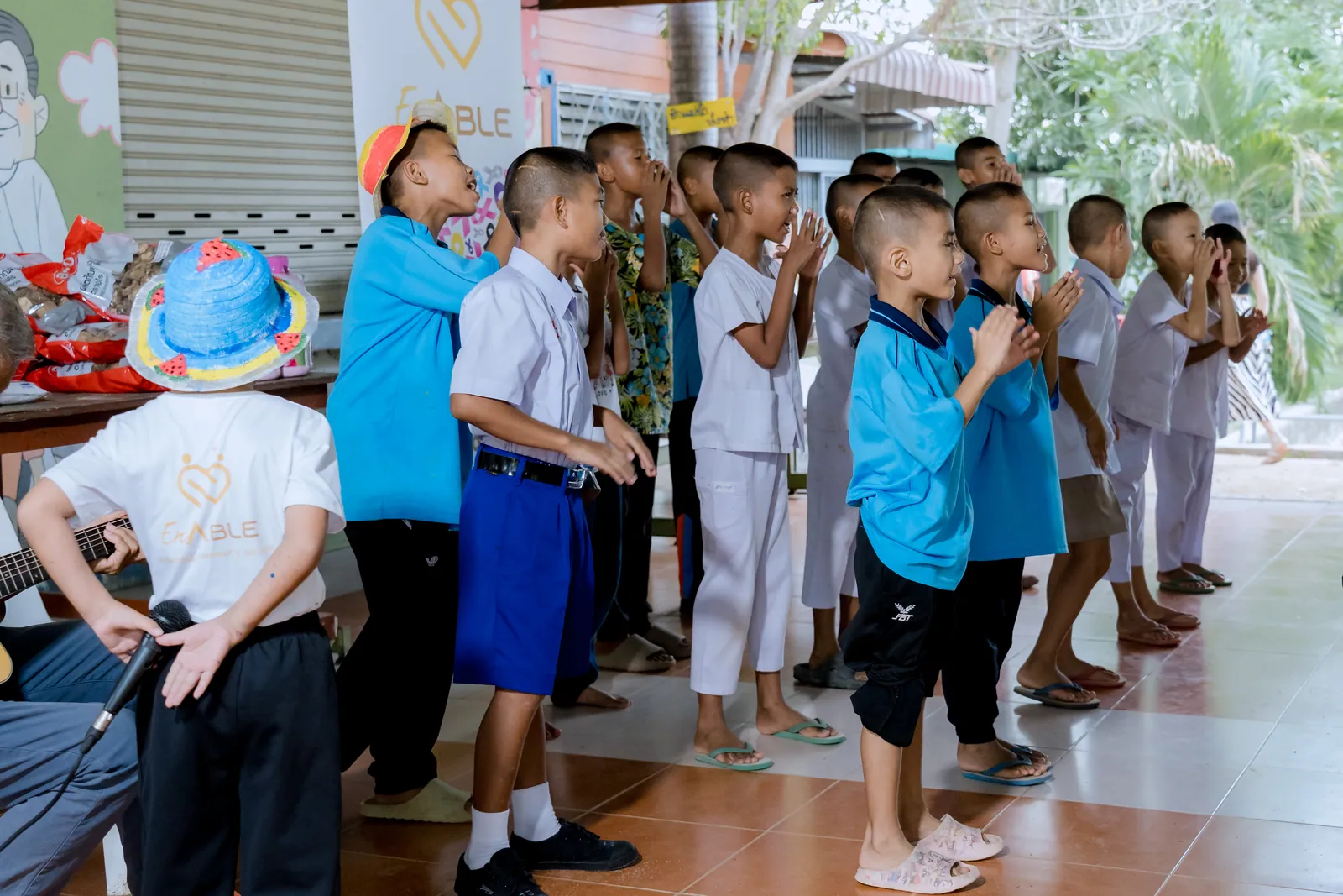 Children singing and clapping together